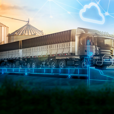 Caminhão em balança rodoviária moderna com elementos gráficos de conectividade em nuvem e IoT.
